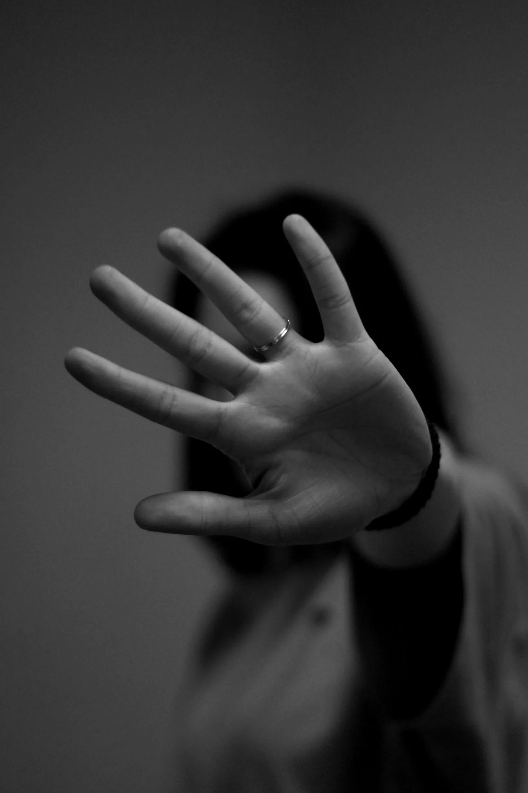woman showing left hand woman showing left hand with wedding band