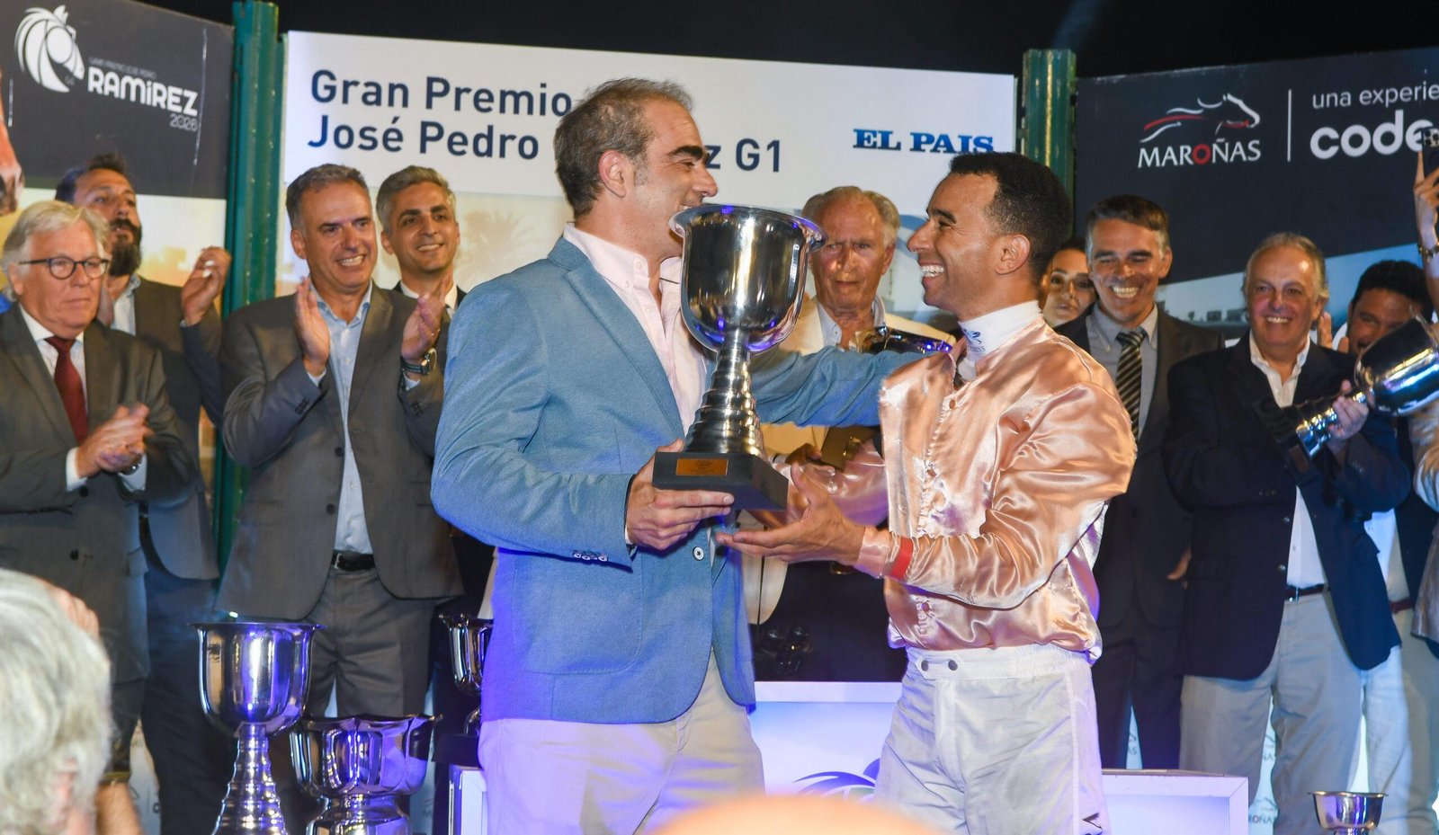 Jornada del Gran Premio José Pedro Ramírez en Maroñas, Montevideo, con cartelía de H. Stagnari